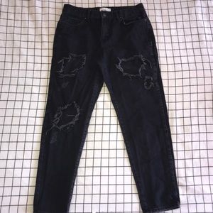 Trendy and cute black boyfriend jeans with rips